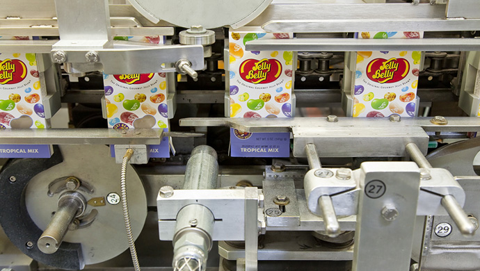 Printing on confectionary products in production line 