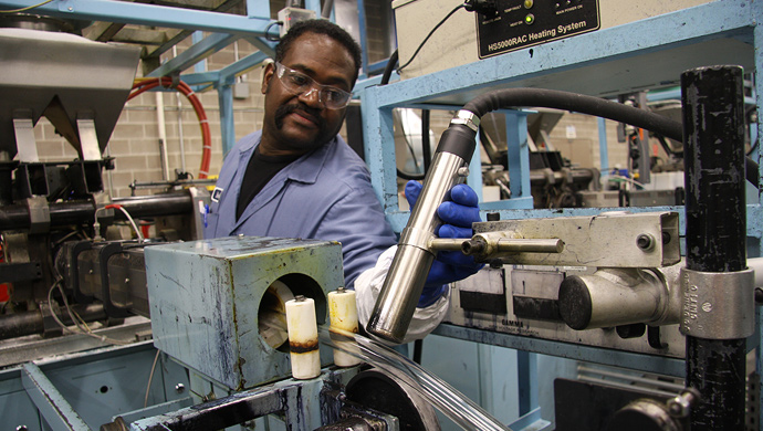 Cable marking machine being used by an operator