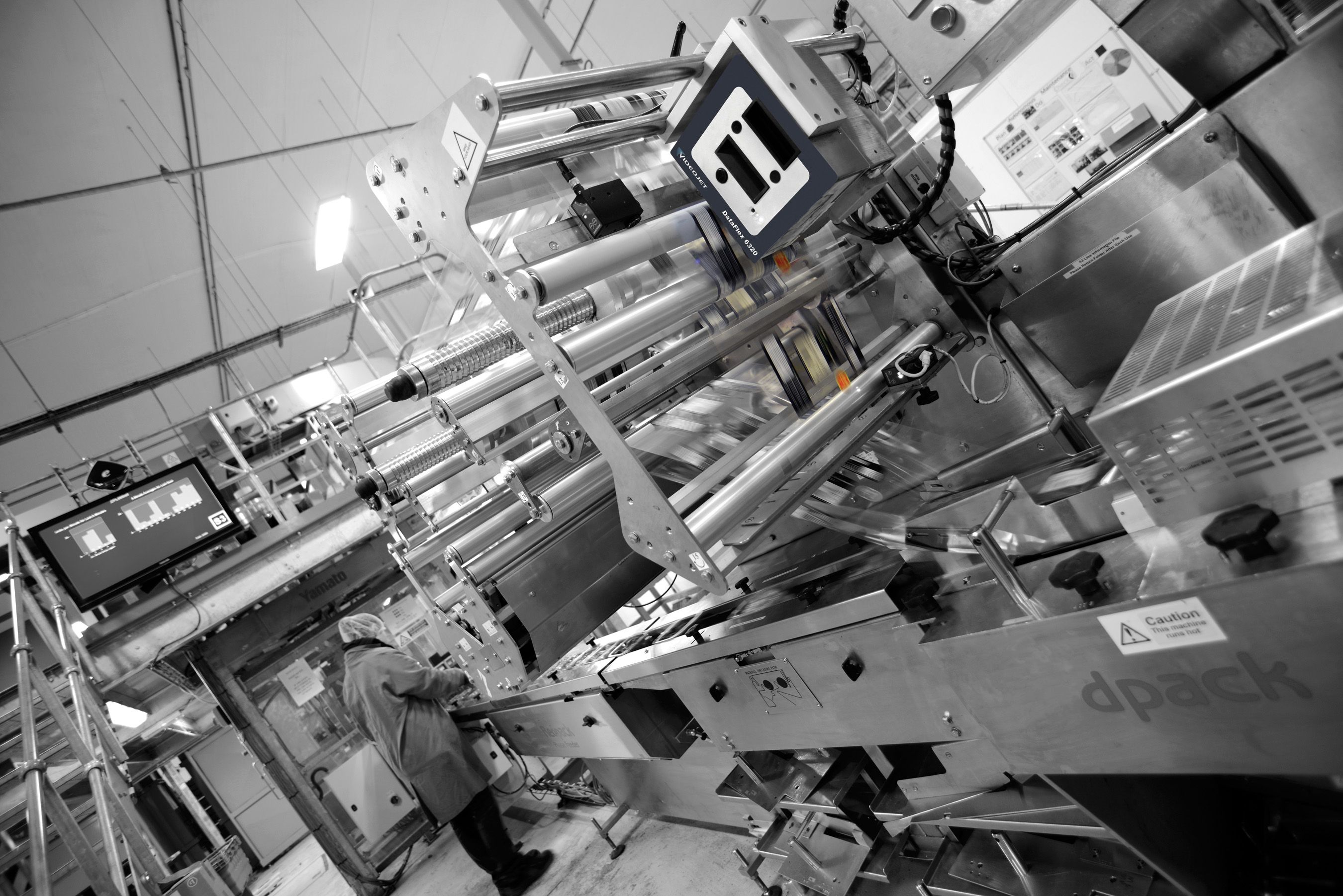 Flowpack machine met geïntegreerde thermische transfer overprinter