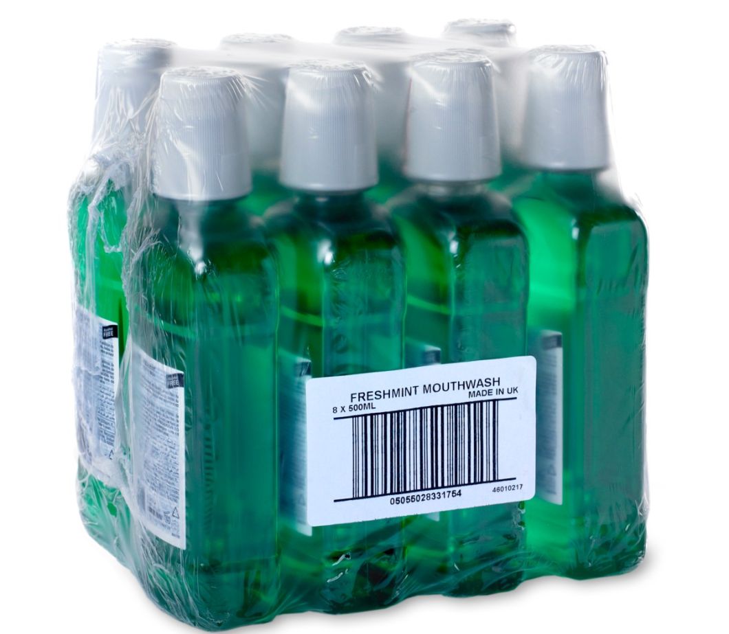 口内洗浄剤ボトル　シュリンク包装にバーコードラベルを貼り付け