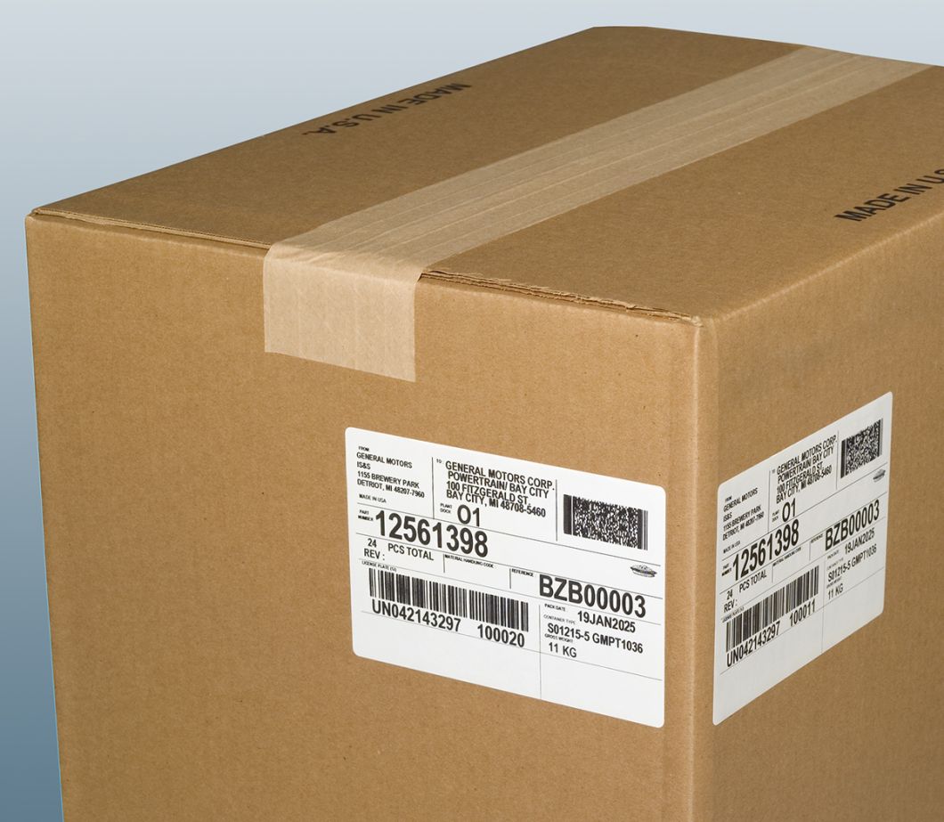 A sealed corrugated box that has labels with variable information printed and applied to adjacent sides