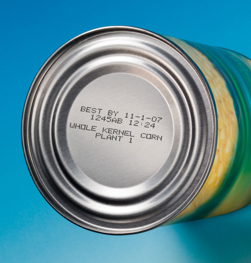Videojet Excel DN双喷头小字符喷码机在罐头瓶底的生产日期喷码样图