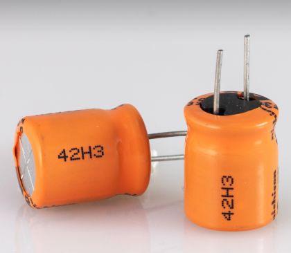 CIJ product marking: one line alpha-numeric codes in black ink on plastic electronic component