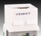 CIJ product marking: one line alpha-numeric code in black ink on hard plastic electronic component