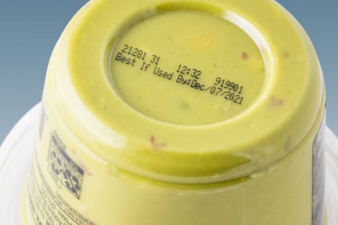 産業用インクジェットプリンタによるガラス瓶へのロット番号の印字