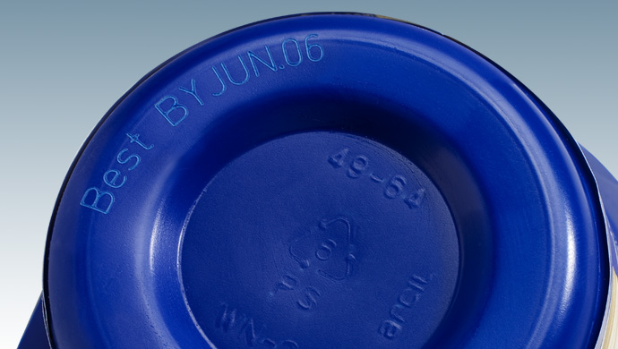 "Best By JUN06" and some additional markings and numbers embossed into its surface
