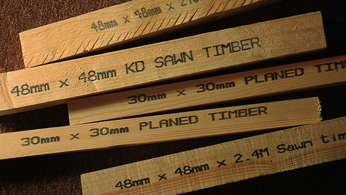 Variable data on pieces of wood, printed by a wood printing machine